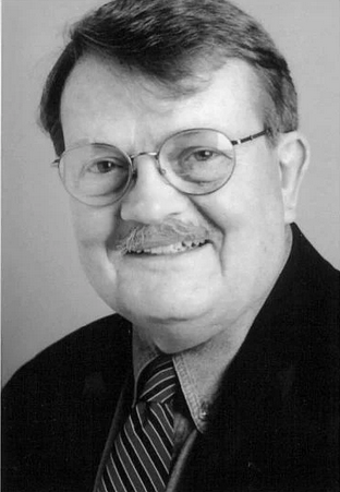 Photo of author John Tracy